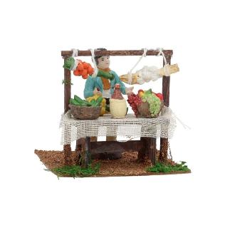 ESCENA FIG HOMBRE C/FRUTAS 12X12X10.5 CM